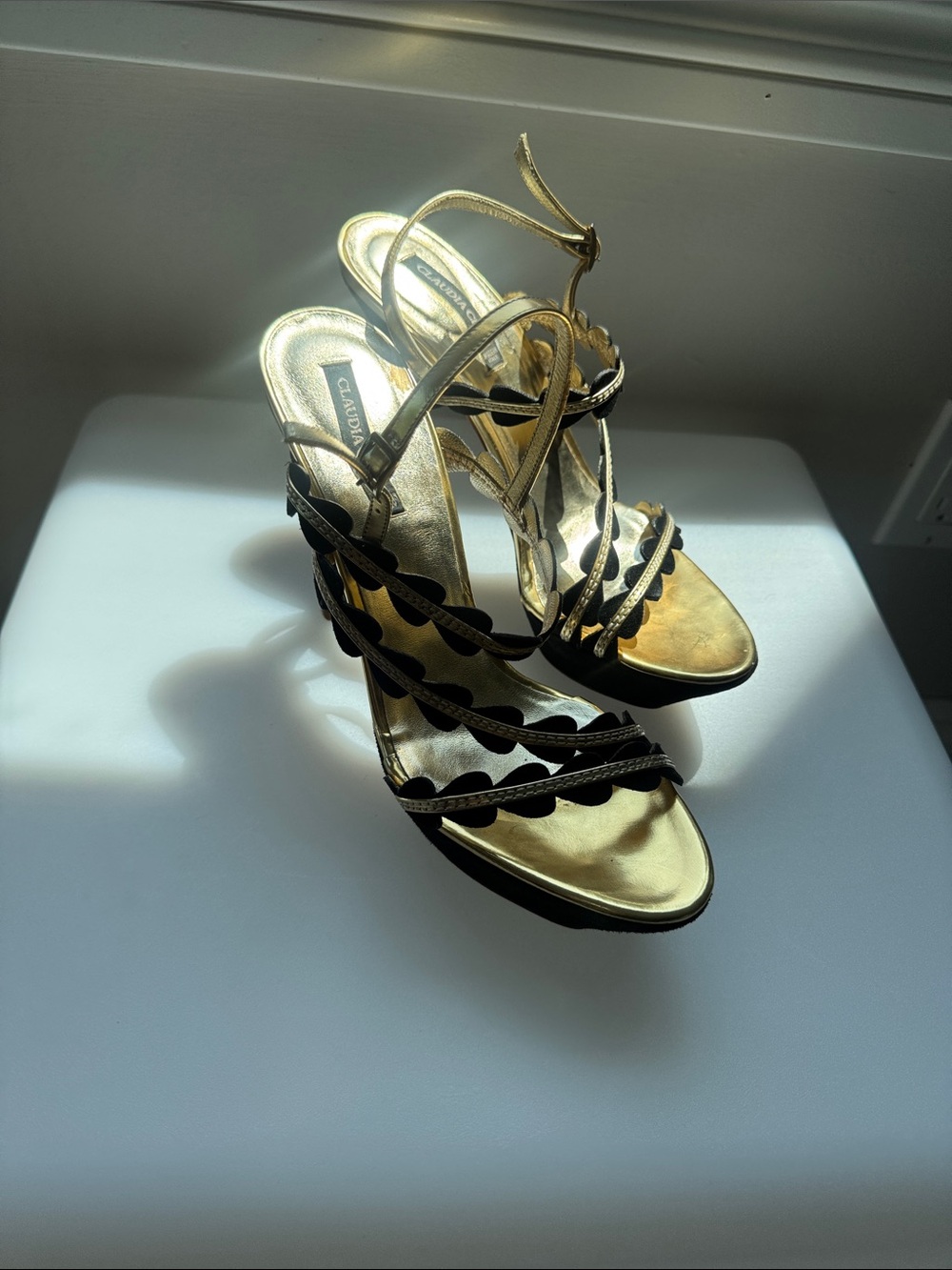 Claudia Ciuti Metallic Gold and Black Scalloped Strap Heels